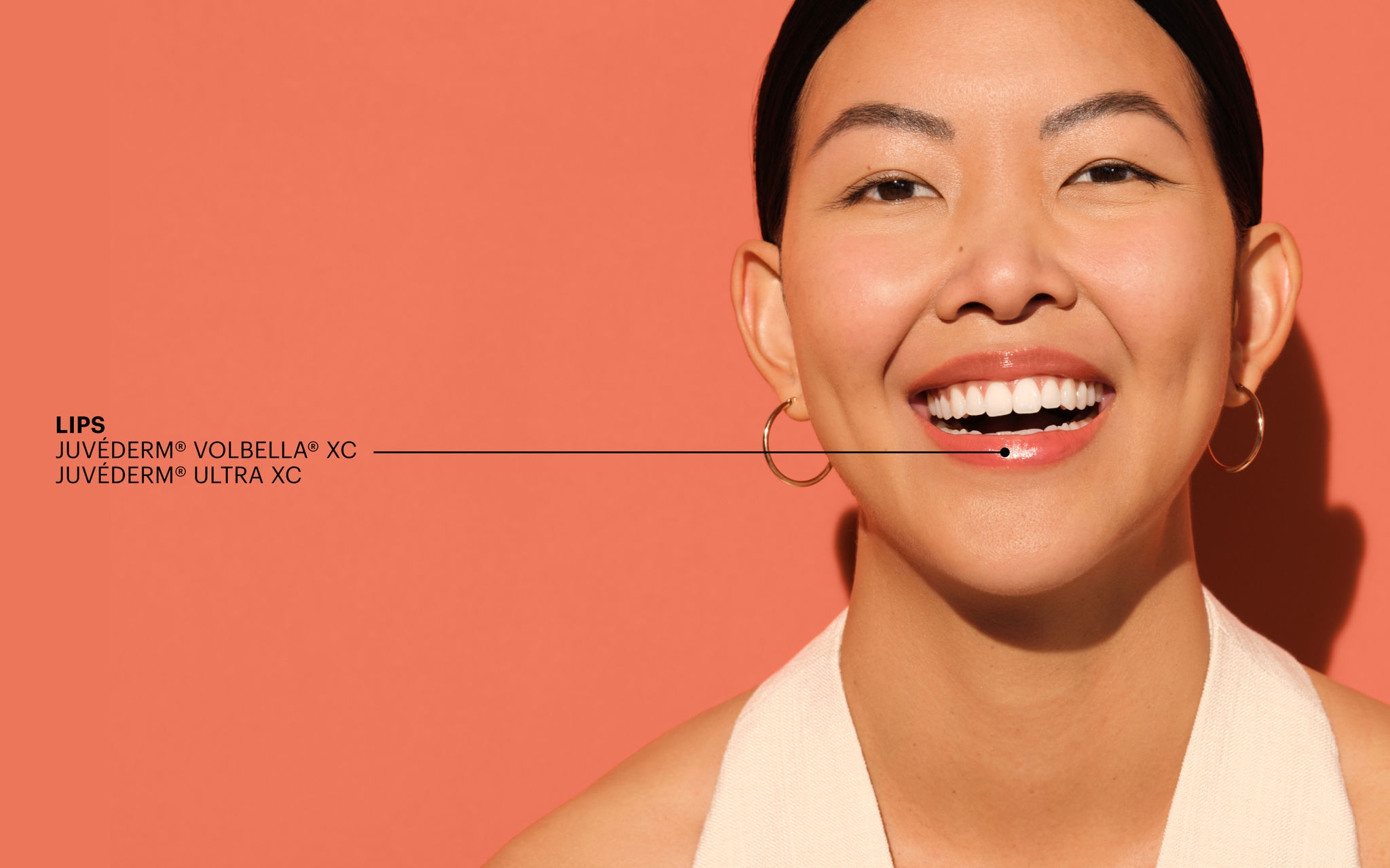 Woman smiling with full and natural looking lips